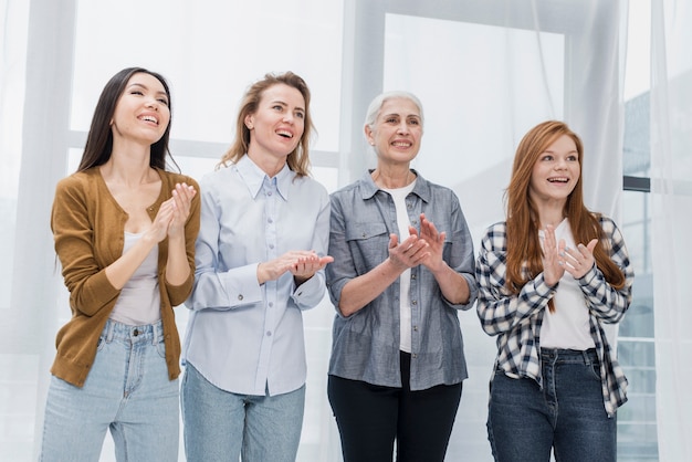 Community of beautiful women smiling