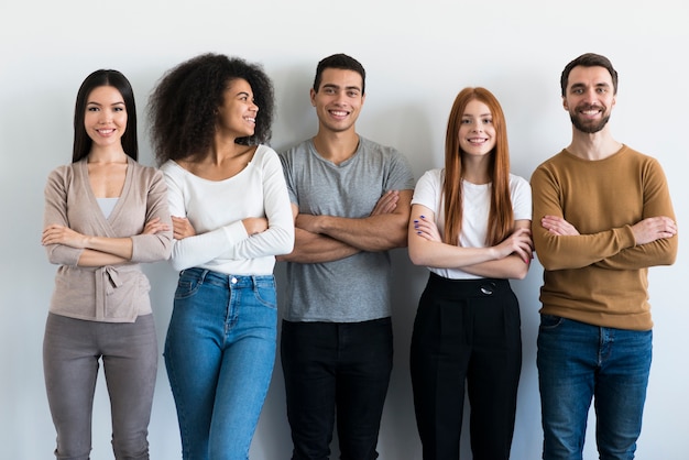 Community of young people posing together