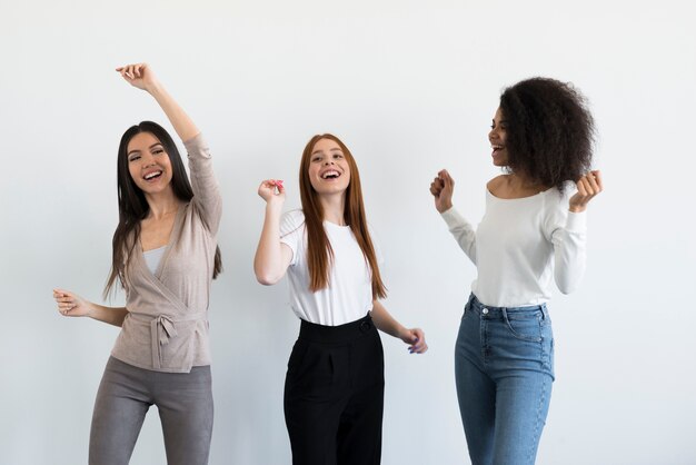 Community of young women celebrating together