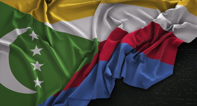 Comoros Flag Wrinkled On Dark Background 3D Render