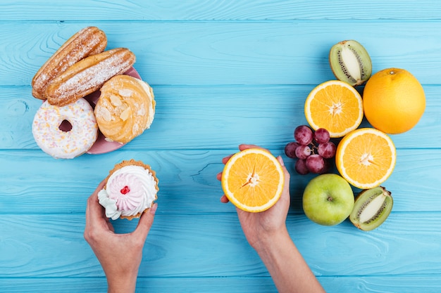 Free Photo comparison between fruit and sweets