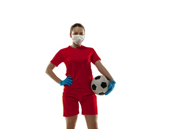 Competition. Female football player in protective mask and gloves.