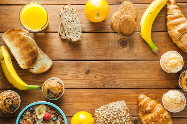 Composed fruit and bread on wood