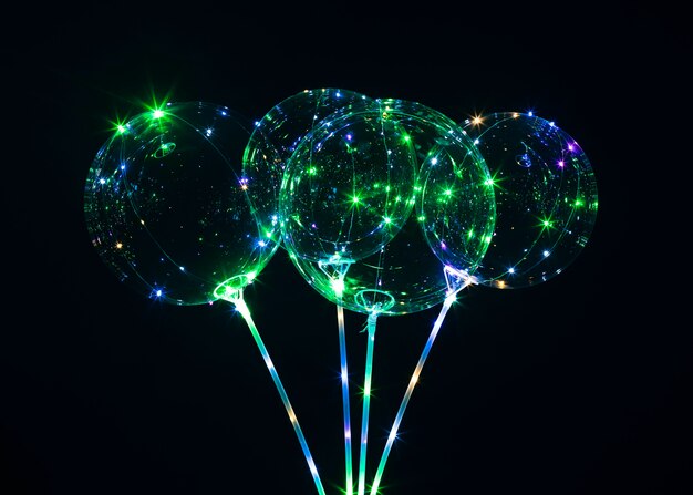 Composition of balloons with light in dark