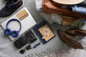 Free photo composition of clothes and accessories in a suitcase