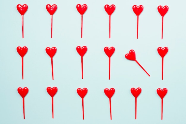 Free photo composition of cute heart sticks