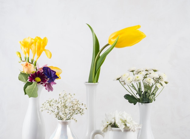 Composition of fresh flowers in vases