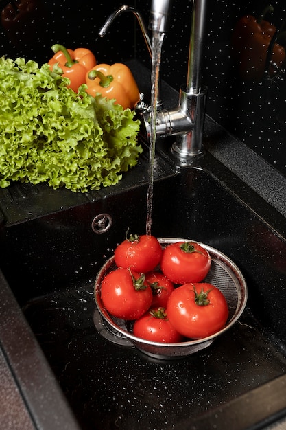 Composition of healthy food being washed