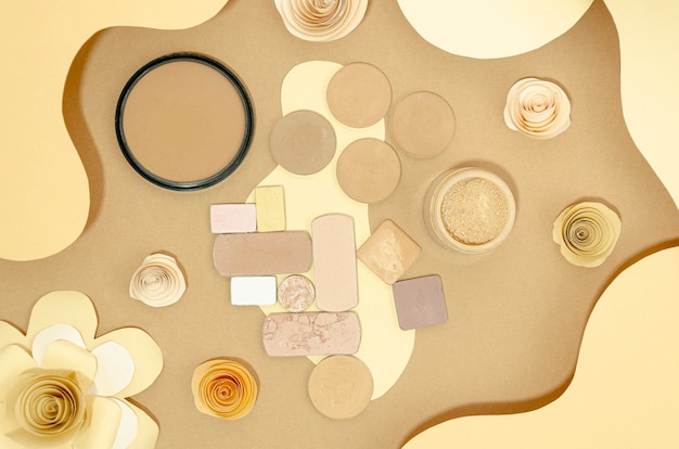 Free Photo composition of nude cosmetics on beige background