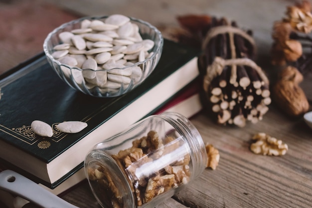 Composition of nuts with books