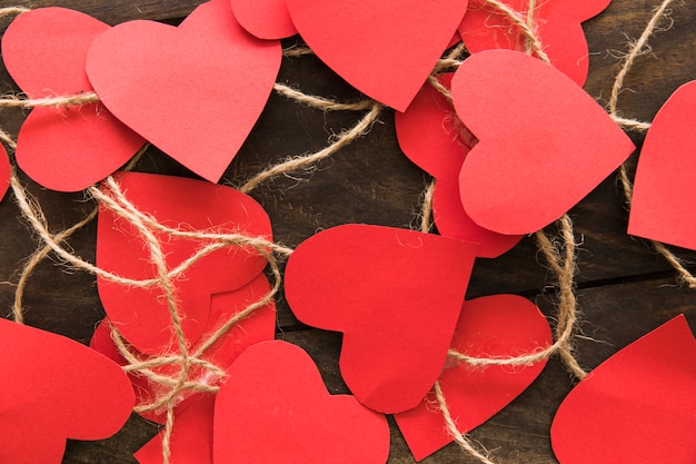 Free photo composition of red paper hearts with twists