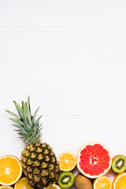 Composition of sliced colorful tropical fruits