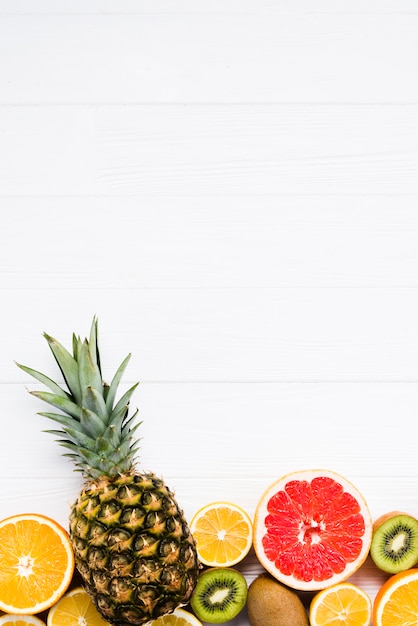 Composition of sliced colorful tropical fruits