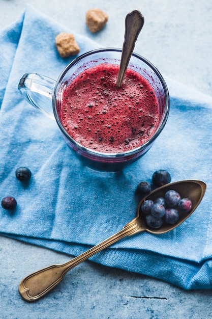 Free photo composition of tasty blueberries smoothie