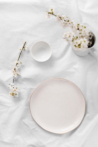 Composition of white table for a delicious meal