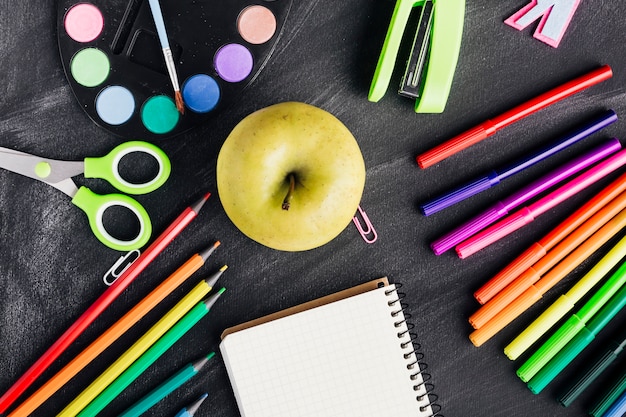 Free photo composition with apple and stationery