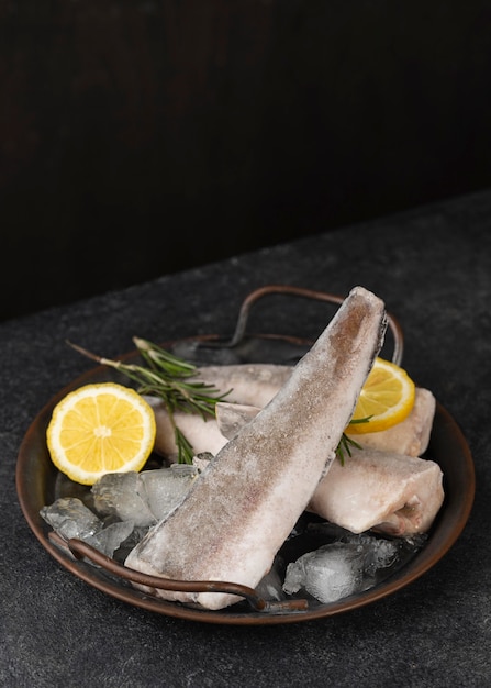 Composition with frozen fish on the table