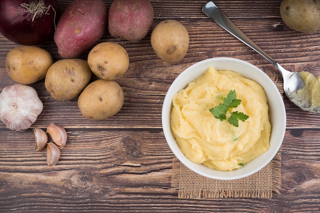 Free photo composition with mashed potatoes on wooden table