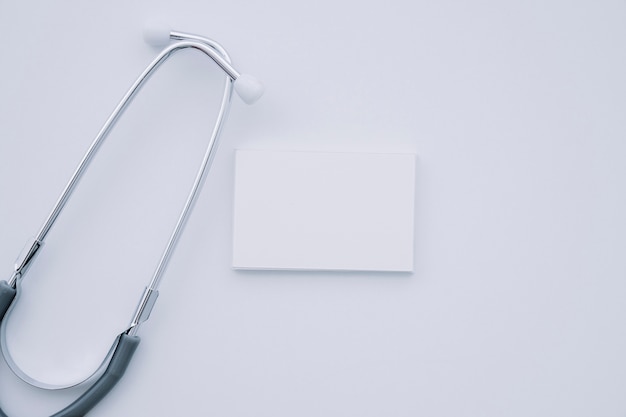 Composition with stethoscope and business card