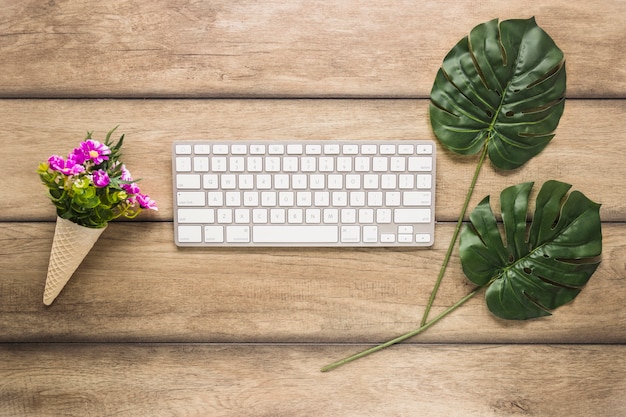 Free Photo computer keypad with leafs and flowers