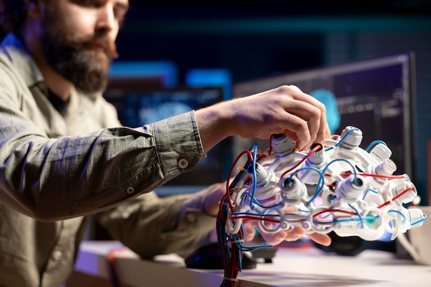 Free Photo computer scientist installing electrodes wires on eeg headset