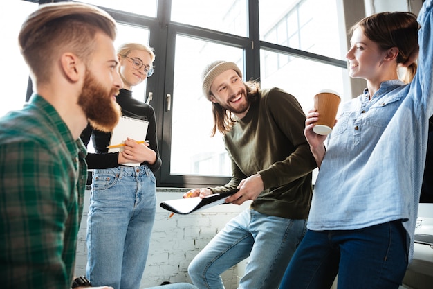 Free Photo concentrated colleagues in office talking with each other