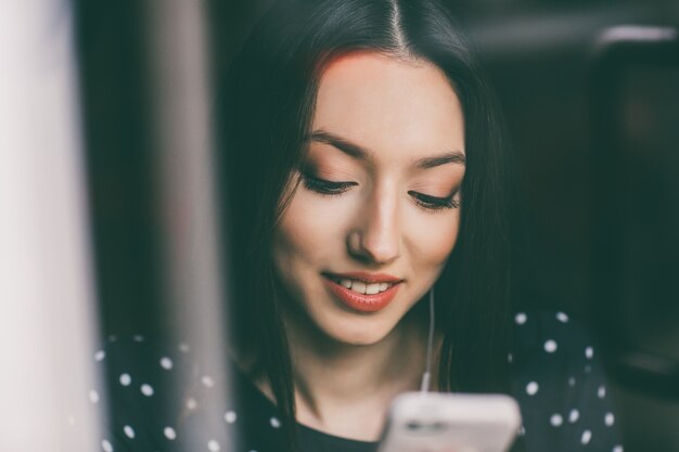 Concentrated student with her phone