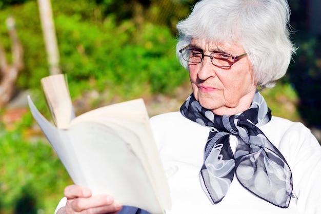 Concentrated woman enjoying a novel