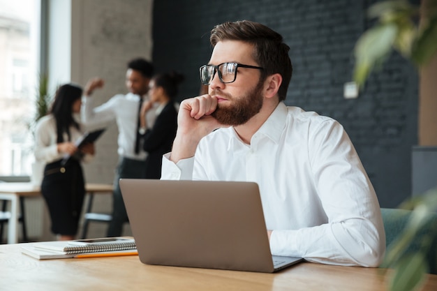 Concentrated young caucasian businessman