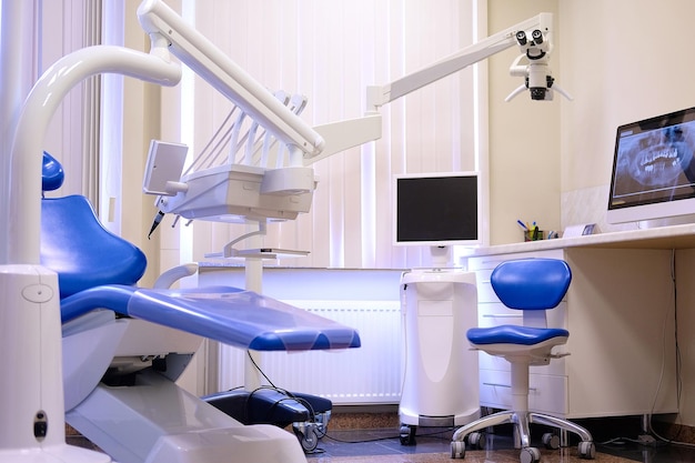 Free Photo concept interior of new modern dental clinic office. dental equipment.