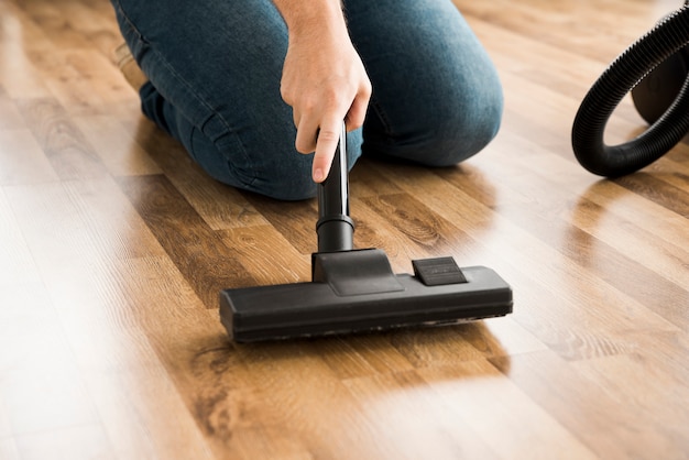 Concept of man cleaning his home