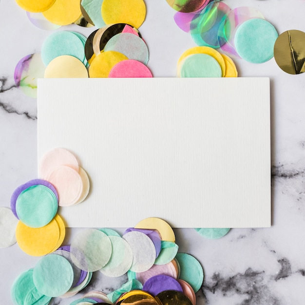 Free photo confetti surrounding card