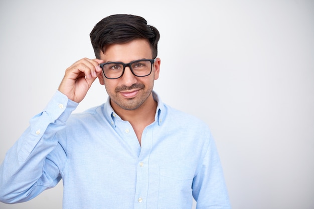 Confident businessman in eyeglasses