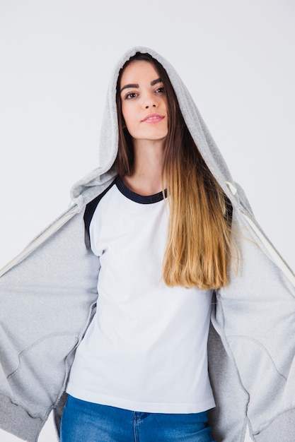 Free photo confident girl with sweatshirt