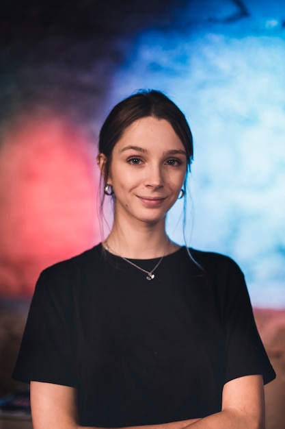 Confident waitress looking at camera