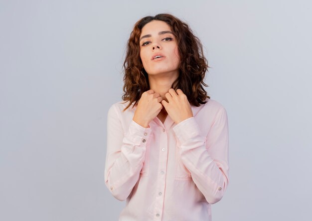 Confident young caucasian woman holds collar