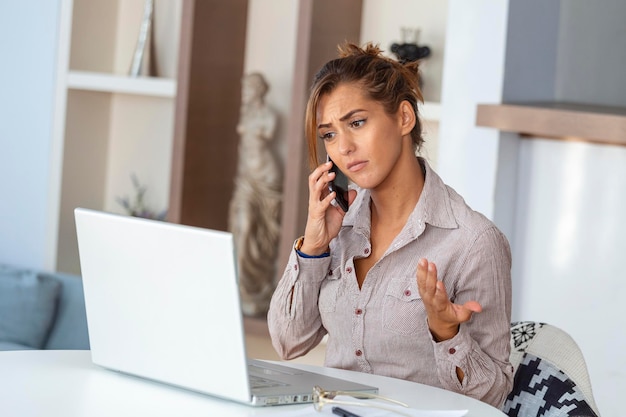 Free Photo confused customer calling support service at office outraged young female employee talking by phone i don't want to hear excuses