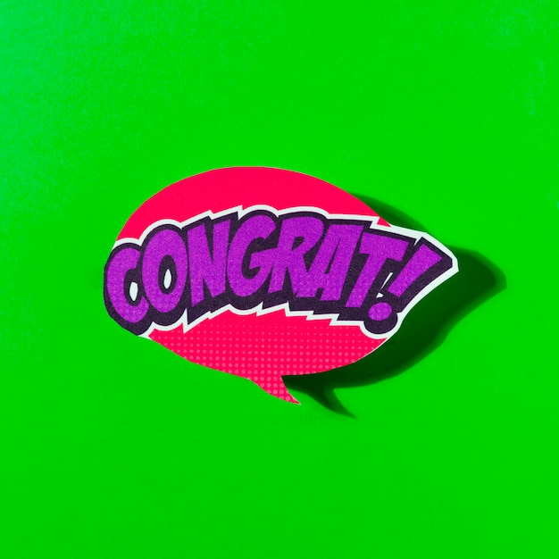 Congrats speech bubble comic explosion pop art style on green background