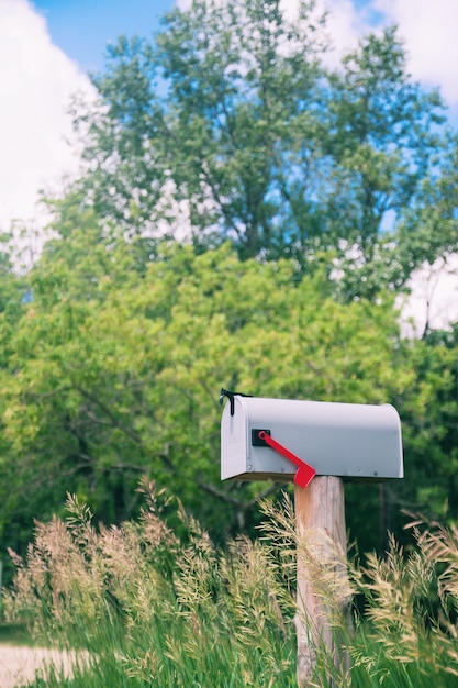 container flag gravel postal mailbox