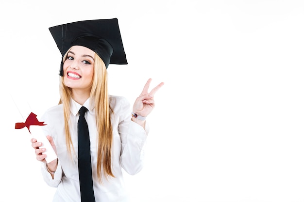 Content alumnus gesturing at camera with diploma