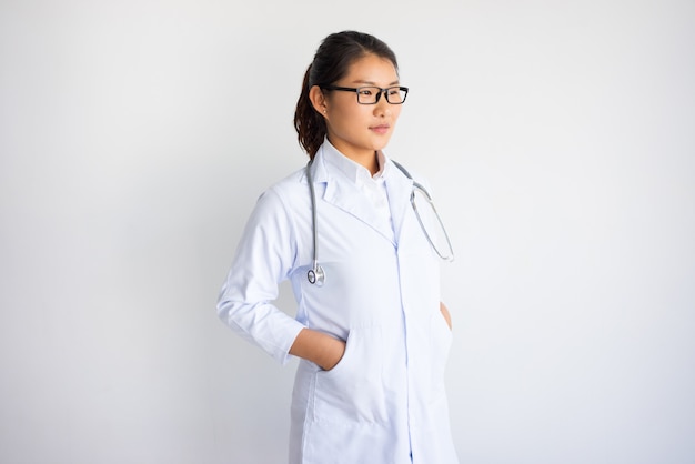 Free photo content pretty young asian female doctor.