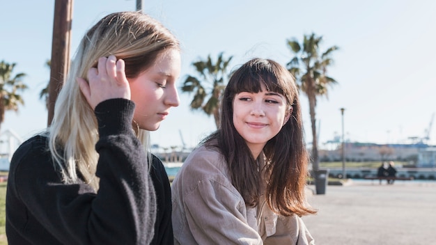 Content relaxing girls spending time together