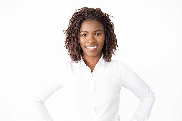 Content young businesswoman smiling at camera