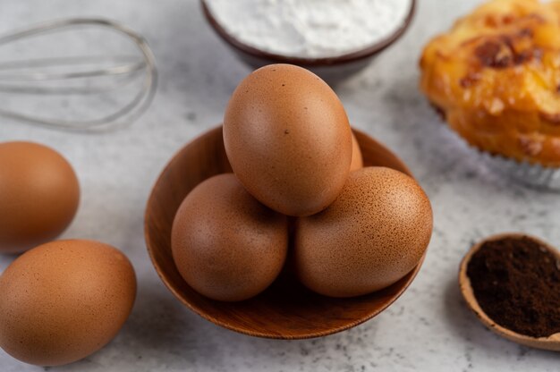 Cooked bread with ingredients Eggs and tapioca flour in a cup.