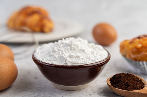 Cooked bread with ingredients Eggs and tapioca flour in a cup.