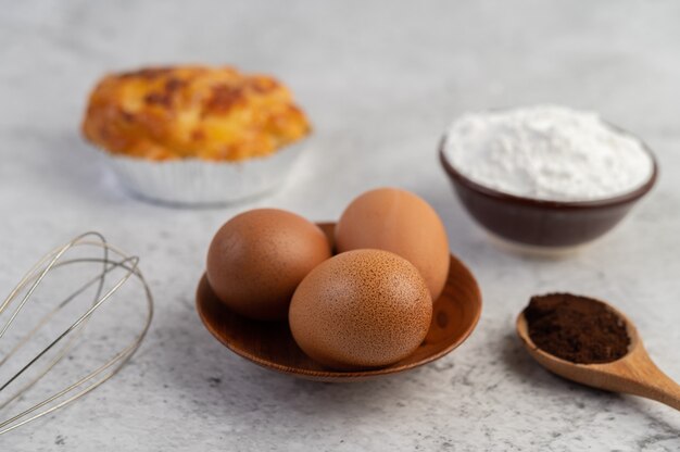 Cooked bread with ingredients Eggs and tapioca flour in a cup.