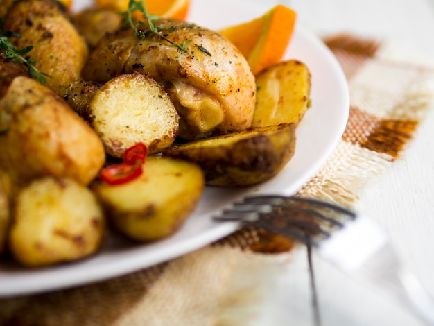 Cooked chicken legs with herbs