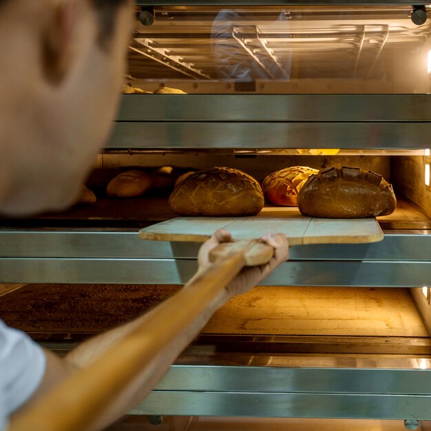 Cooked fresh breads in furnace