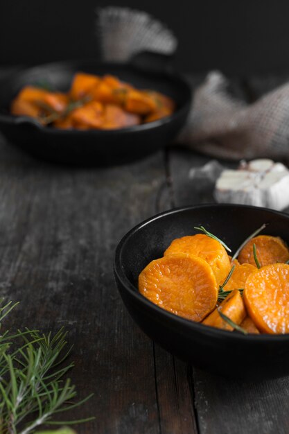 Cooked sweet potatoes in bowls