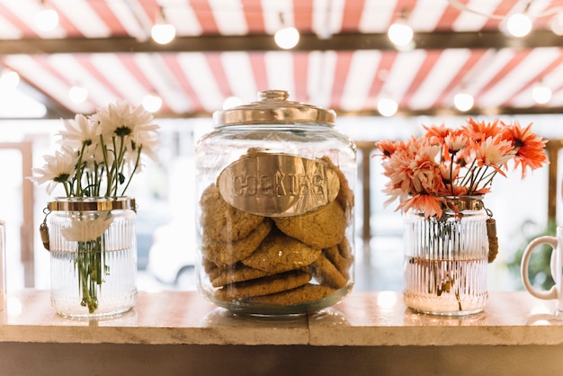 Free photo cookie jar flowers vases